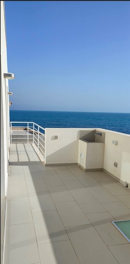 For sale "The waves of Cicirata" seaside villa in Avola with three apartments with sea view